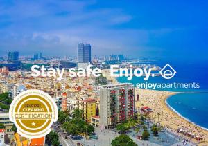 a view of a city with a beach and a sign at Sagrada Familia III by Enjoy Apartments in Barcelona