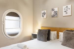 Postel nebo postele na pokoji v ubytování Sagrada Familia I by Enjoy Apartments