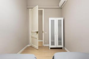 Posteľ alebo postele v izbe v ubytovaní Sagrada Familia I by Enjoy Apartments