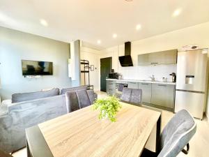 Kuchyň nebo kuchyňský kout v ubytování COLMAR - Appartements Deluxe - Lumineux - Stationnement Gratuit et Facile dans la rue
