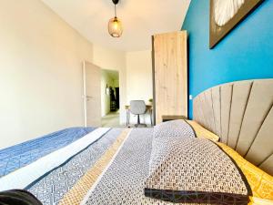 Postel nebo postele na pokoji v ubytování COLMAR - Appartements Deluxe - Lumineux - Stationnement Gratuit et Facile dans la rue