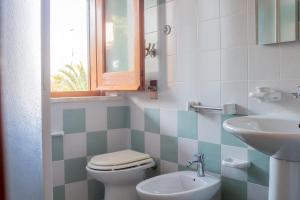 A bathroom at Villino Agave Még 26 kép