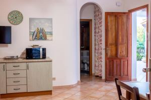 A kitchen or kitchenette at Villino Agave