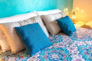 A bed or beds in a room at Villino Agave