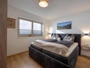 Postel nebo postele na pokoji v ubytování Apartment Filzenkogel