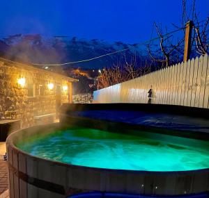 a hot tub in the middle of a yard at night at snowflake.golan in Majdal Shams
