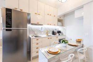 Dapur atau dapur kecil di Rosemari's Apartments 4 Studios Luxuosos