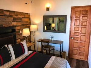 Voodi või voodid majutusasutuse Casa Bravía - Hotel·RV toas