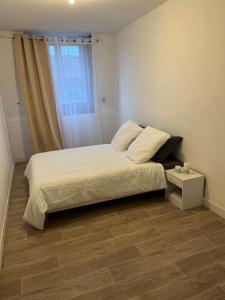 Postel nebo postele na pokoji v ubytování Appartement à Roubaix