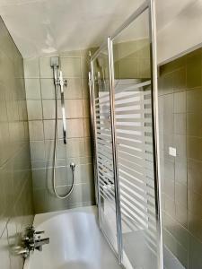 a bathroom with a shower and a sink at Loft Esquilino Terrazza a Stazione Termini in Rome