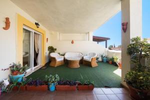 A garden outside NEW ROYAL TORREQUEBRADA BEACH ideal for families & groups