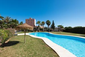 The swimming pool at or close to NEW ROYAL TORREQUEBRADA BEACH ideal for families & groups