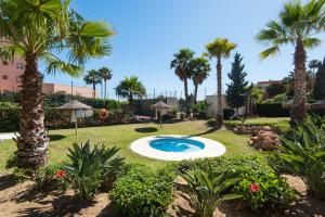 A garden outside NEW ROYAL TORREQUEBRADA BEACH ideal for families & groups