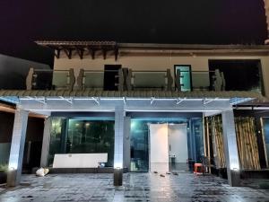 a building with chairs on top of it at night at 184 GURNEY DRIVE PENANG in George Town
