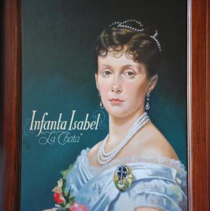 a painting of a woman in a blue dress at Hotel Infanta Isabel by Recordis Hotels in Segovia