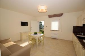 A television and/or entertainment centre at Agriturismo Villa Adimari