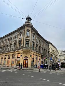 a large building on the corner of a street at SDesign Luxury Zagreb apartment in Zagreb