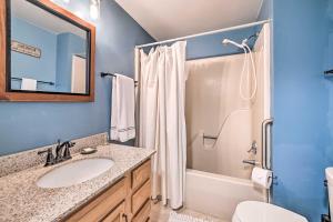 a bathroom with a sink and a shower and a toilet at Spacious Franklin Cabin w/ Mountain Views! in Franklin +28 photos
