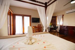 Ένα ή περισσότερα κρεβάτια σε δωμάτιο στο Hidden Jewel Boutique Hotel