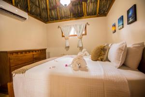 Ένα ή περισσότερα κρεβάτια σε δωμάτιο στο Hidden Jewel Boutique Hotel