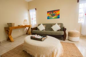 Ένα ή περισσότερα κρεβάτια σε δωμάτιο στο Hidden Jewel Boutique Hotel