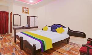 Postel nebo postele na pokoji v ubytování Itsy Hotels Hill Town, 500 Mtrs From Madikeri Fort
