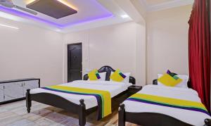 Postel nebo postele na pokoji v ubytování Itsy Hotels Hill Town, 500 Mtrs From Madikeri Fort