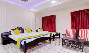 Postel nebo postele na pokoji v ubytování Itsy Hotels Hill Town, 500 Mtrs From Madikeri Fort