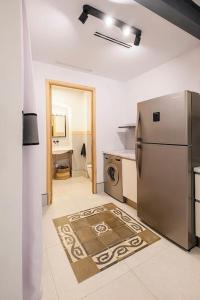 Kuchyň nebo kuchyňský kout v ubytování Piso-Loft COS Jaén Centro