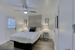 a bedroom with a bed and a ceiling fan at Guest House Getaway in Memphis
