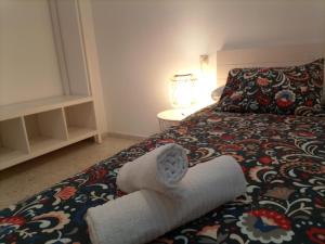 Postel nebo postele na pokoji v ubytování Apartamento playa de Levante
