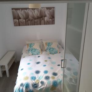 Säng eller sängar i ett rum på Patio de Rivas y Palma
