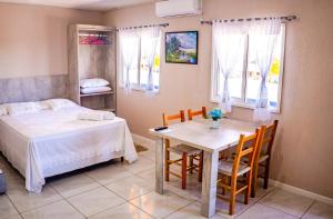 Ένα ή περισσότερα κρεβάτια σε δωμάτιο στο Pousada SDOIS +47 φωτογραφίες