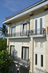 Balkón nebo terasa v ubytování Wijaya Guest House Ubud