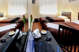 Postel nebo postele na pokoji v ubytování Hotel Liburnia