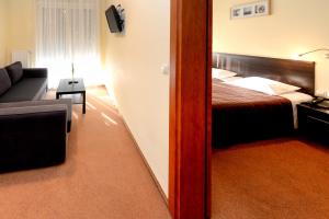 Postel nebo postele na pokoji v ubytování Hotel Liburnia