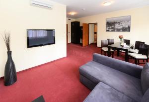 TV a/nebo společenská místnost v ubytování Hotel Liburnia