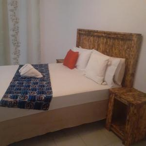 Кровать или кровати в номере Sunshinevibe guest house