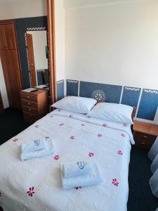 Postel nebo postele na pokoji v ubytování Ośrodek Wypoczynkowy Start