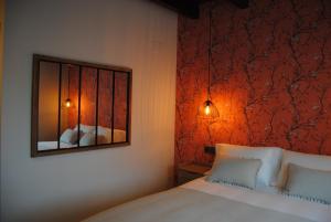 A bed or beds in a room at Hotel a Ecogranxa