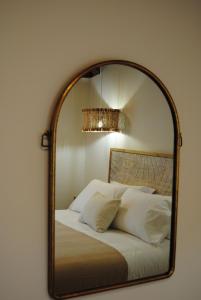 A bed or beds in a room at Hotel a Ecogranxa
