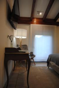 A seating area at Hotel a Ecogranxa