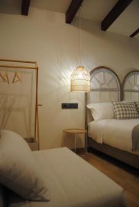A bed or beds in a room at Hotel a Ecogranxa