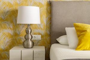 Ein Bett oder Betten in einem Zimmer der Unterkunft Spacious & Quiet apartment by HelloMalaga - AZAHAR