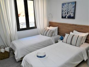 Postel nebo postele na pokoji v ubytování Villa Vitabel sea view in Lindos