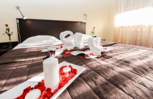 Postel nebo postele na pokoji v ubytování Hotel Liburnia