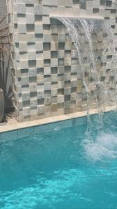 Bazén v ubytování Villa Das Conchas nebo v jeho okolí