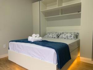 Una cama o camas en una habitación de Villa Das Conchas