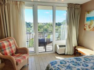 Balkón nebo terasa v ubytování Lovely Sandestin Resort Studio with Balcony and Sunset View