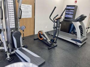a gym with treadmill and elliptical machines at Best Western Emporia Inn in Emporia +5 photos